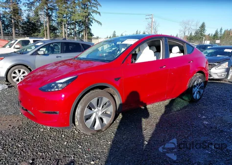 2023 Tesla Model Y Awd/Long Range Dual Motor All-Wheel Drive z USA, uszkodzony, nr VIN 7SAYGDEE1PF838577